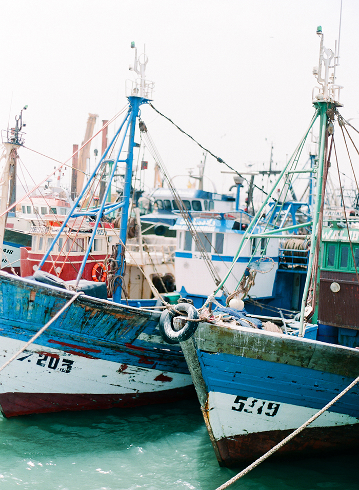 Boats in the Moroccan seaside town of Essaouira, by Laura Ivanova Photography