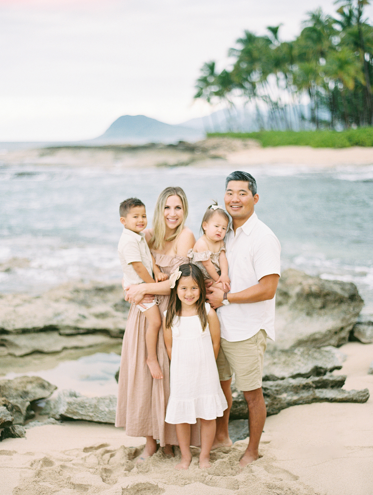 Aulani family photographer, Laura Ivanova captures this family of five, on film, on Oahu, Hawaii