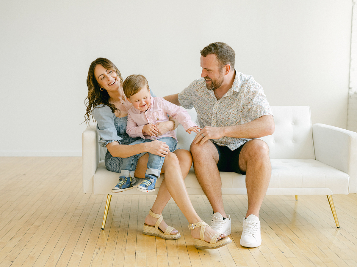 Minneapolis family photographer, Laura Ivanova, captured this family + maternity session at her natural light studio in Northeast Minneapolis