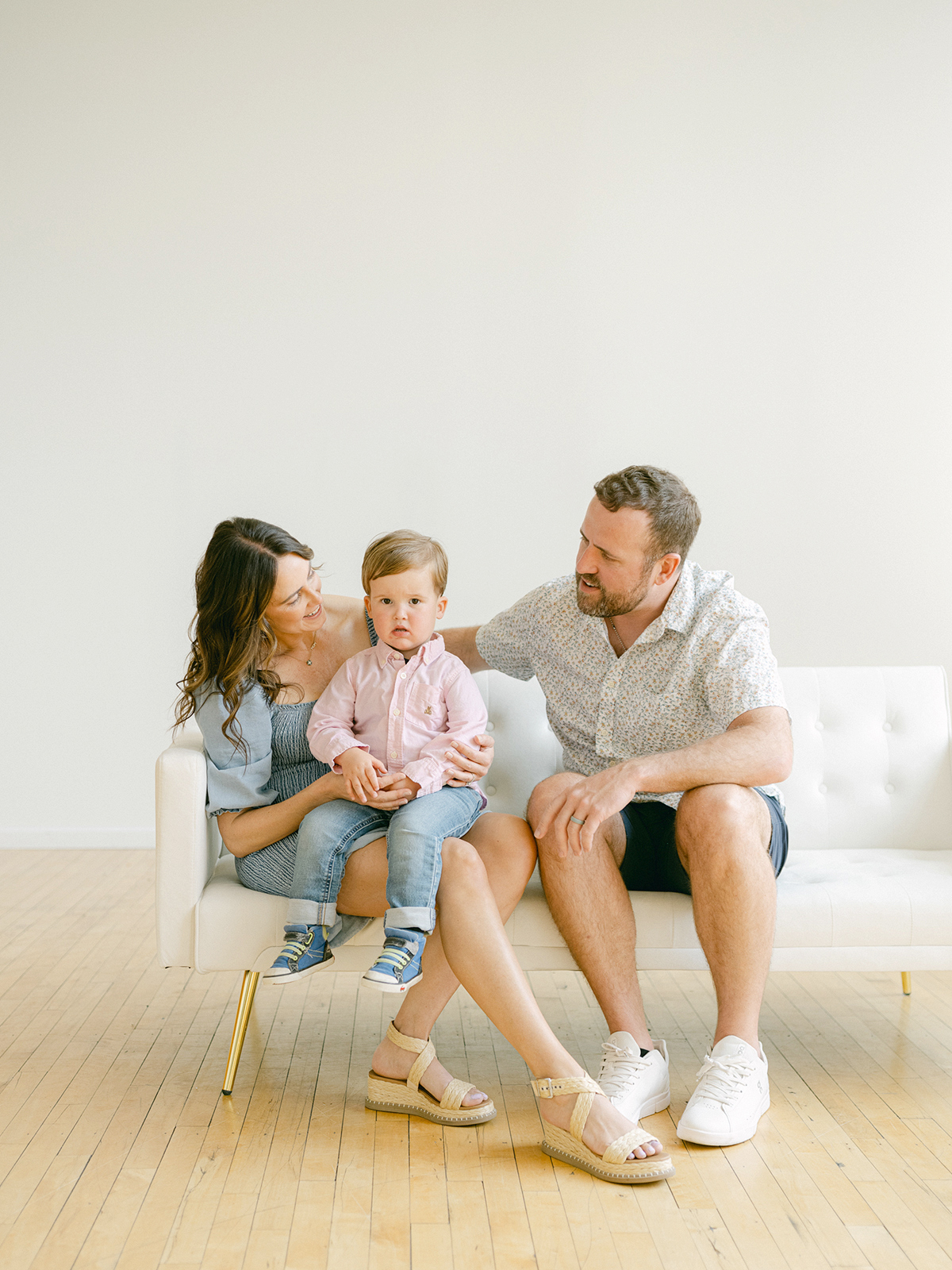 Minneapolis family photographer, Laura Ivanova, captured this family + maternity session at her natural light studio in Northeast Minneapolis