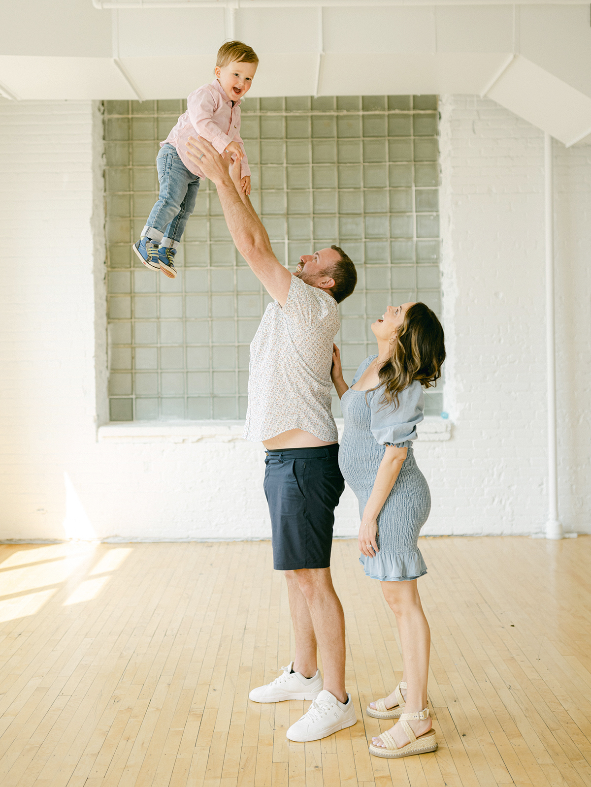 Minneapolis family photographer, Laura Ivanova, captured this family + maternity session at her natural light studio in Northeast Minneapolis