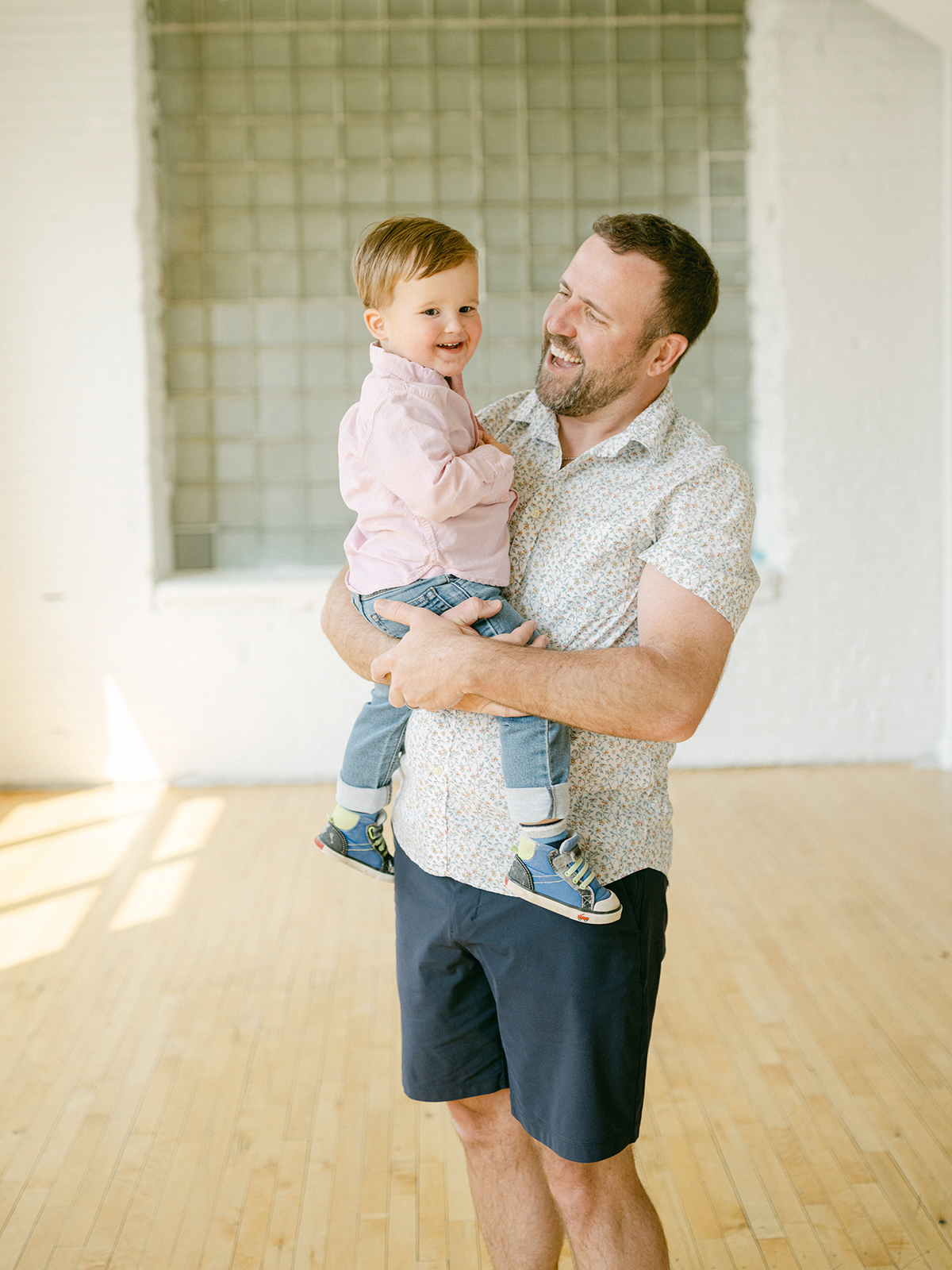 Minneapolis family photographer, Laura Ivanova, captured this family + maternity session at her natural light studio in Northeast Minneapolis