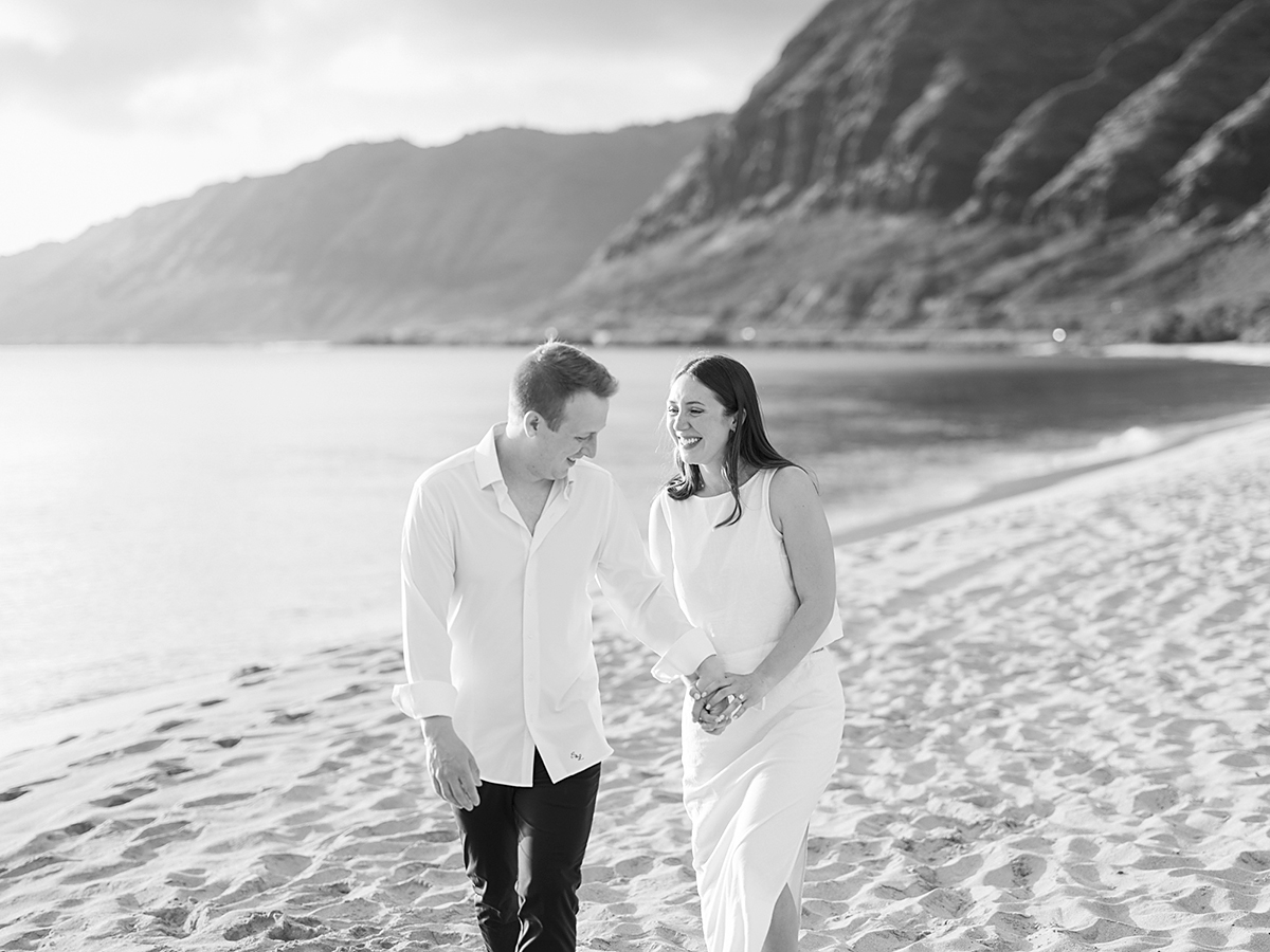 Oahu proposal photographer, Laura Ivanova, captures a surprise sunset proposal in gorgeous Hawaii